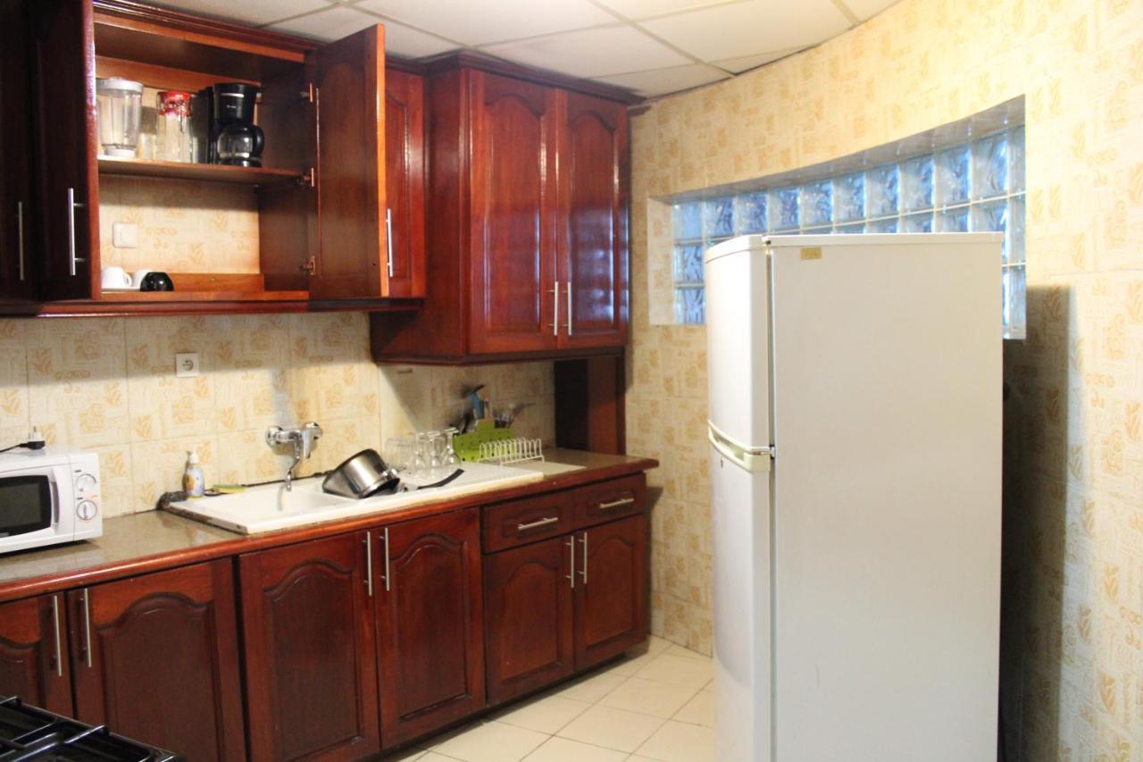 Residence Le Carat Douala Bagian luar foto