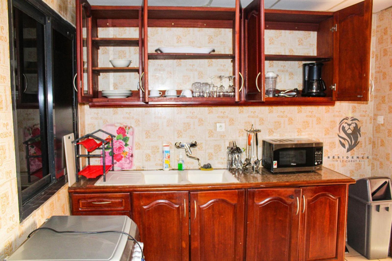 Residence Le Carat Douala Bagian luar foto