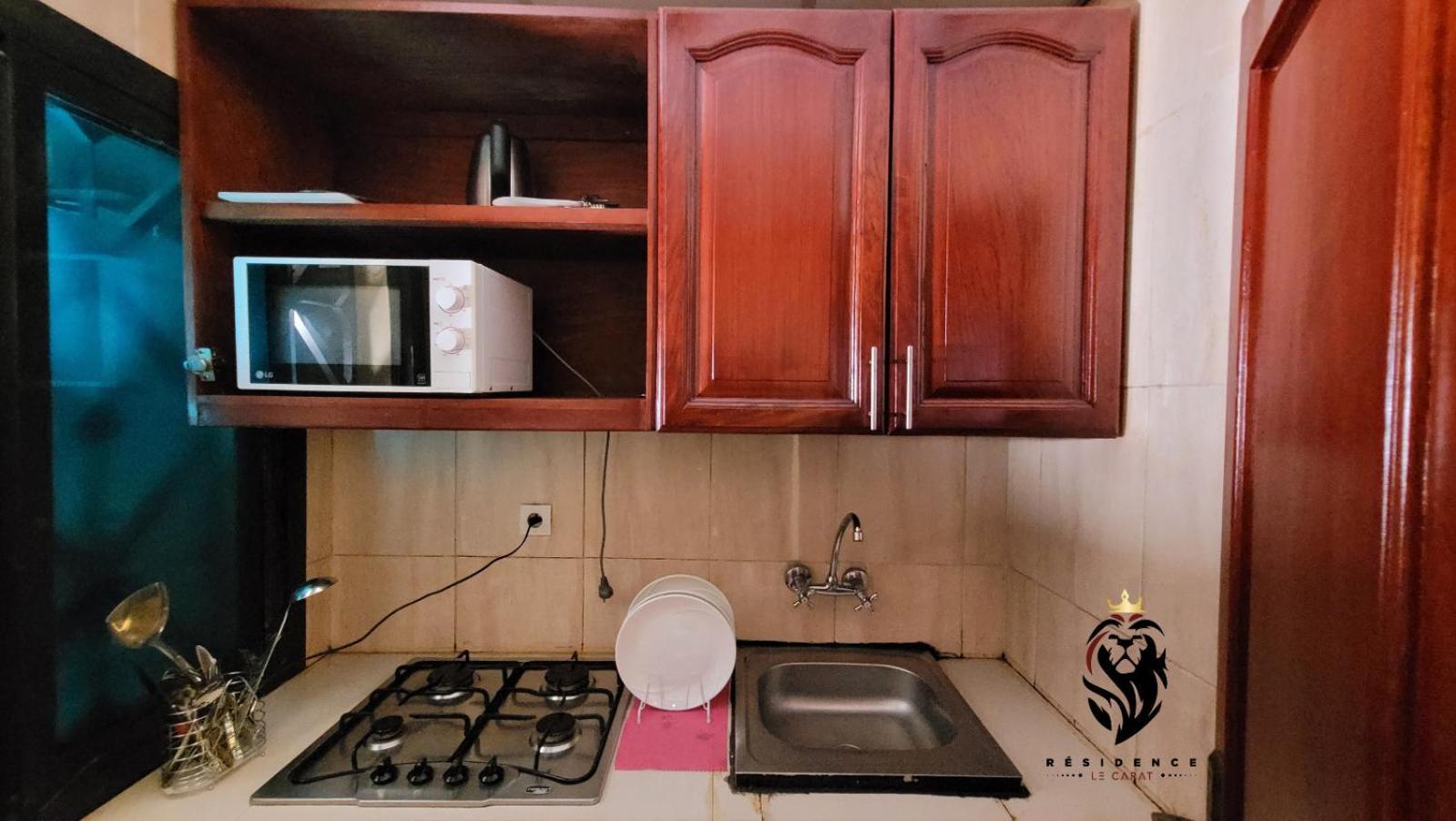 Residence Le Carat Douala Bagian luar foto